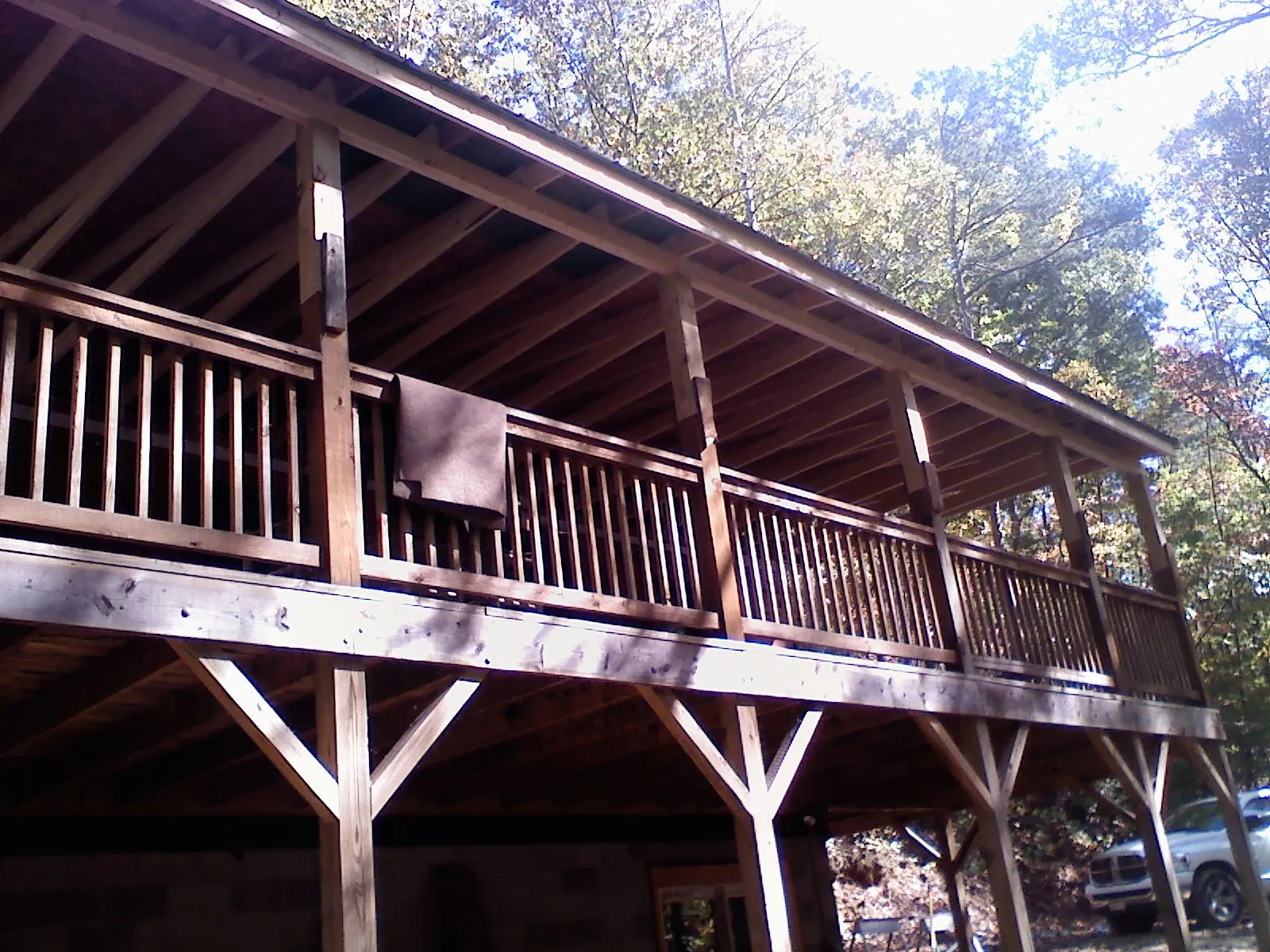 Timber framing under a new elevated porch and deck — Roof Leak Repair in Holtsville by Roofing Brothers